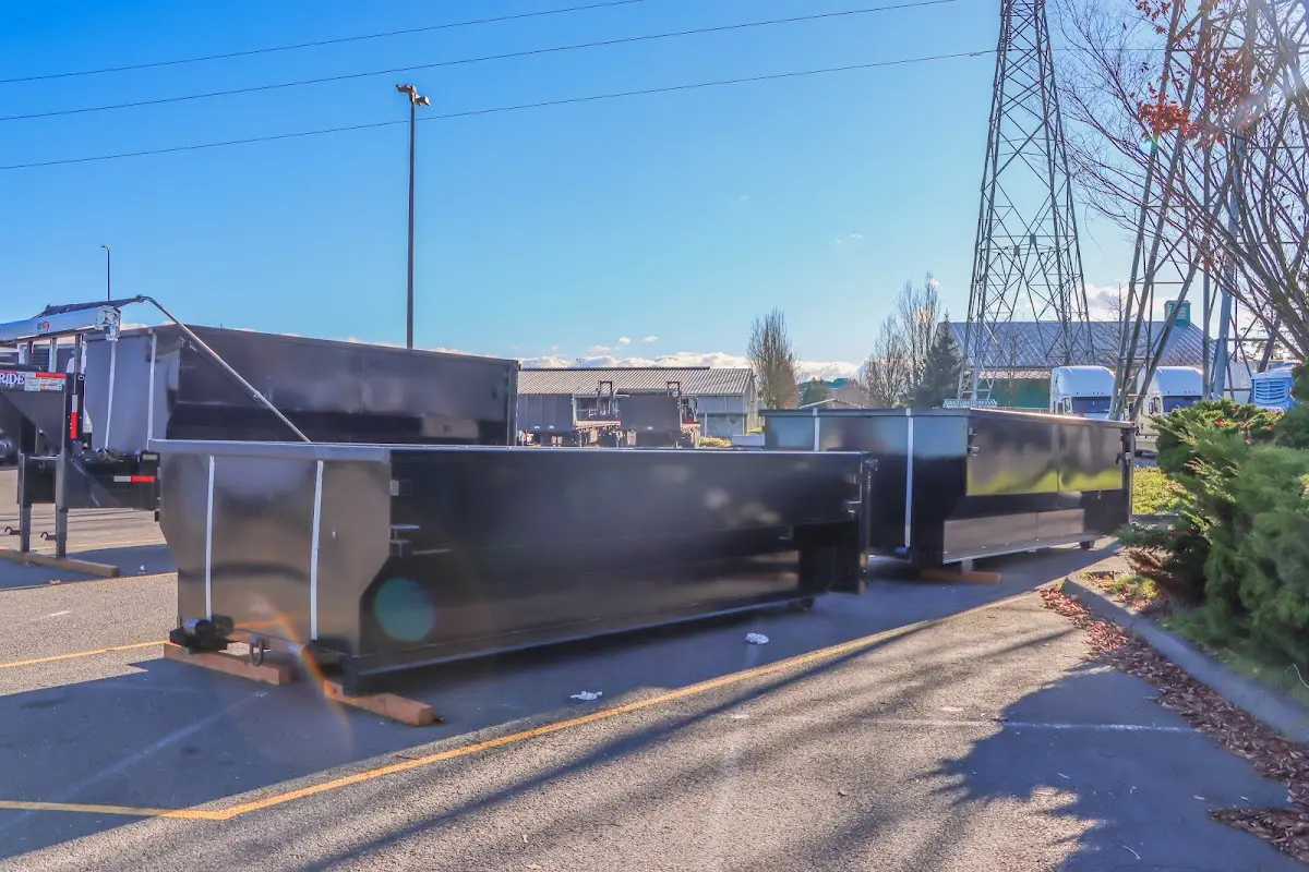 Roll-off dumpster ready for waste disposal at job site for 2 Yard Dumpster Rental in Sikeston